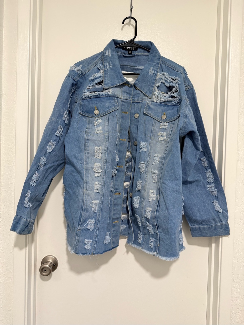 Distressed Light Blue Denim Jacket with Rips - Women